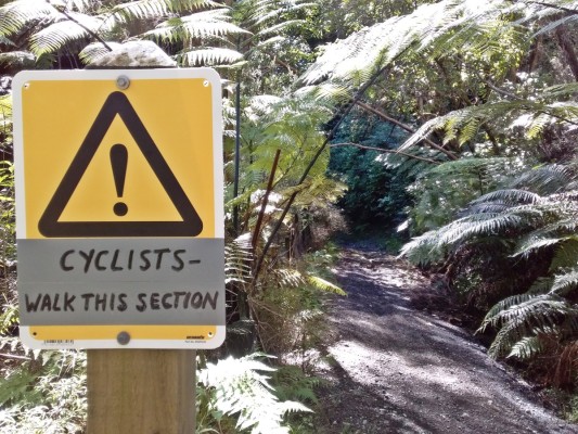 Warning sign above recently scoured out track section. Gillian Ward